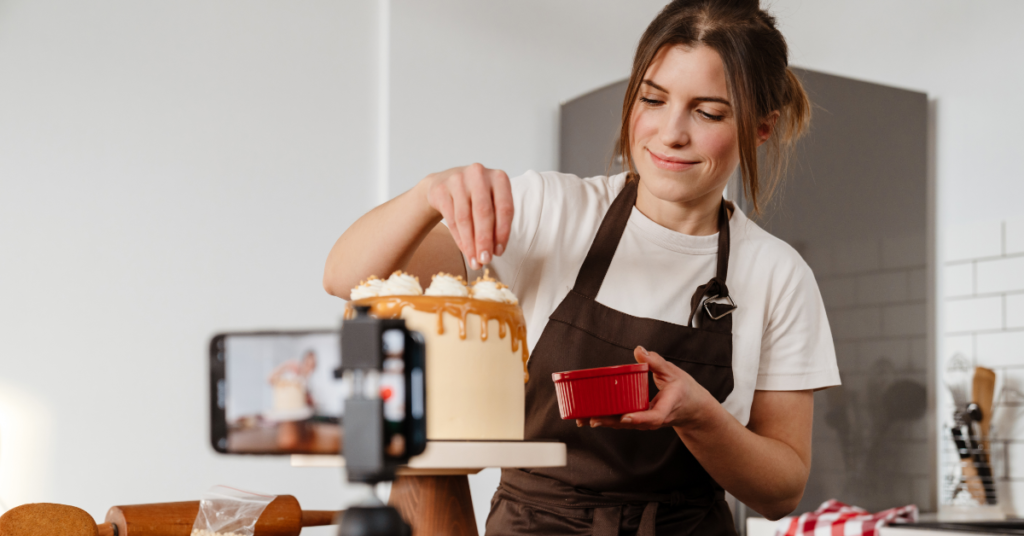 Woman teaching baking online.